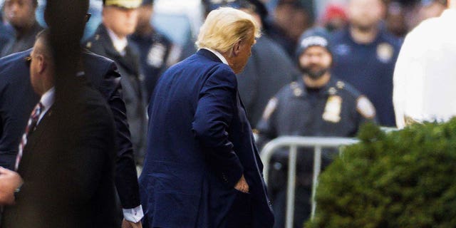 Former U.S. President Donald Trump arrives at Trump Tower, after his indictment by a Manhattan grand jury following a probe into hush money paid to porn star Stormy Daniels, in New York City, U.S April 3, 2023. 