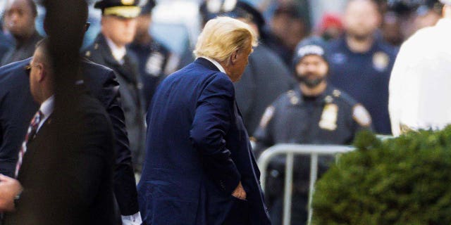 Former U.S. President Donald Trump arrives at Trump Tower, after his indictment by a Manhattan grand jury following a probe into hush money paid to porn star Stormy Daniels, in New York City, U.S April 3, 2023. 