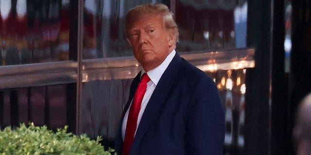Former President Donald Trump arrives at Trump Tower, Monday, April 3, 2023, in New York. Trump arrived in New York on Monday for his booking and arraignment the following day on charges arising from hush money payments during his 2016 campaign. 