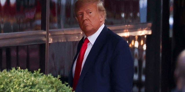 Former President Donald Trump arrives at Trump Tower, Monday, April 3, 2023, in New York. Trump arrived in New York on Monday for his booking and arraignment the following day on charges arising from hush money payments during his 2016 campaign. 