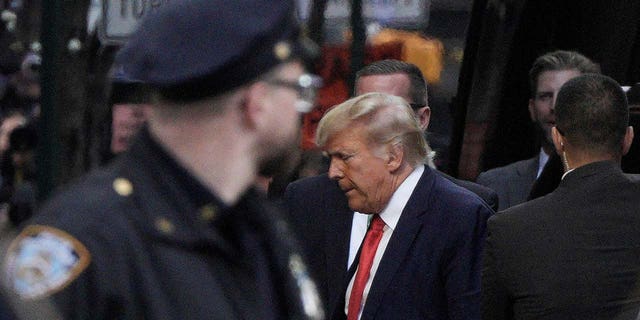 Former US President Donald Trump arrives at Trump Tower after being indicted by a Manhattan grand jury in an investigation into hush money paid to sex film star Stormy Daniels on April 3, 2023 in New York City, USA on April 3, 2023.  