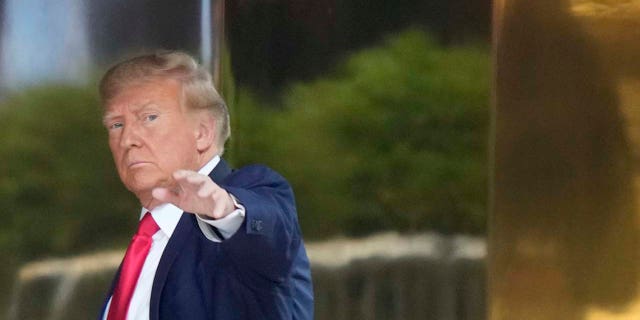 Former president Donald Trump arrives at Trump Tower in New York on Monday, April 3, 2023. Trump is expected to be booked and arraigned on Tuesday on charges arising from hush money payments during his 2016 campaign.