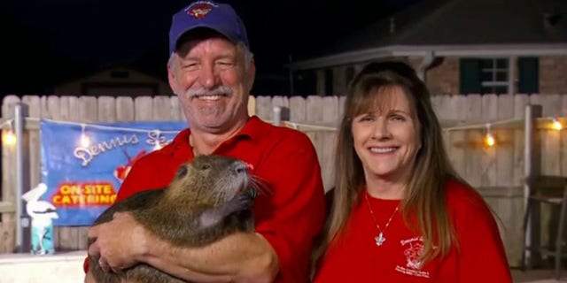 Dennis and Myra Lacoste share introduce Tucker Carlson to their pet Nutria.