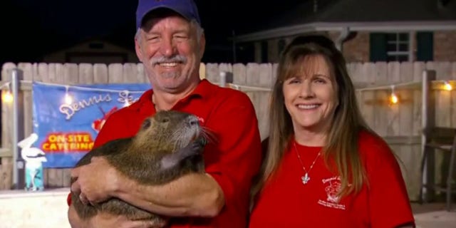 Dennis and Myra Lacoste share introduce Tucker Carlson to their pet Nutria.