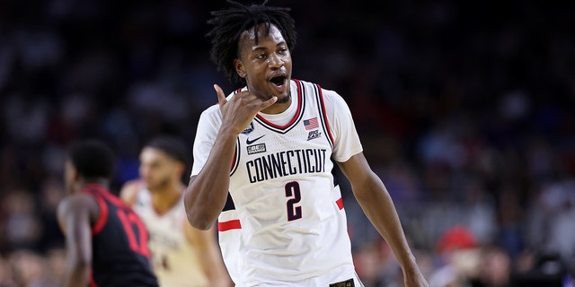 Tristen Newton #2 of the Connecticut Huskies reacts during the first half of the San Diego State Aztecs during the NCAA Men's Basketball Tournament National Championship game at NRG Stadium on April 3, 2023 in Houston, Texas.