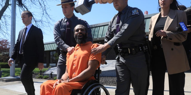 Edward Holley in a wheelchair