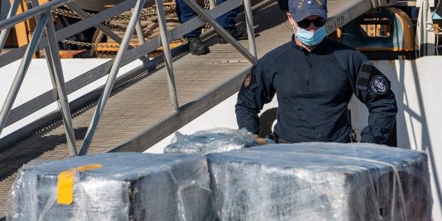 coast guard offloading cocaine bales