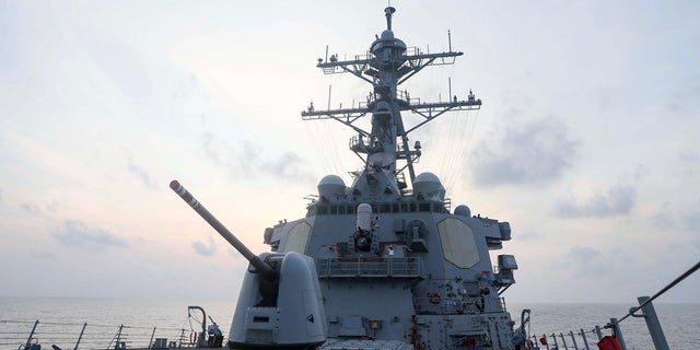 The Arleigh Burke-class guided-missile destroyer USS Milius sails in an undisclosed location on Monday, April 10.