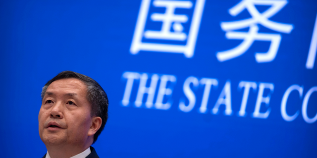 Shen Hongbing, the director of the Chinese Center for Disease Control and Prevention, speaks at a press conference on the origins of COVID-19 at the State Council Information Office in Beijing, Saturday, April 8, 2023.