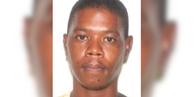 Richard Lee pictured in a mugshot.