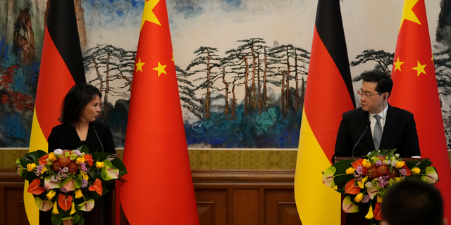 German Foreign Minister Annalena Baerbock (L) and Chinese Foreign Minister Qin Gang attend a joint press conference at the Diaoyutai State Guesthouse on April 14, 2023, in Beijing, China. 