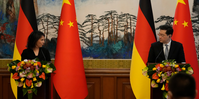 German Foreign Minister Annalena Baerbock (L) and Chinese Foreign Minister Qin Gang attend a joint press conference at the Diaoyutai State Guesthouse on April 14, 2023, in Beijing, China.