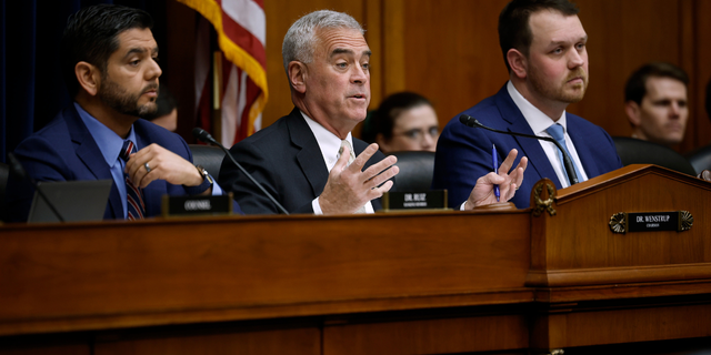 House Select Subcommittee on the Coronavirus Pandemic Chairman Brad Wenstrup (R-OH) (C) questions witnesses during a subcommittee hearing with ranking member Rep. Raul Ruiz (D-CA) (L) in the Rayburn House Office Building on Capitol Hill on March 08, 2023, in Washington, DC. Witnesses and members of the subcommittee aired and debated their disagreements about the possible origins of the COVID-19 coronavirus and whether it came from nature or a laboratory in China.