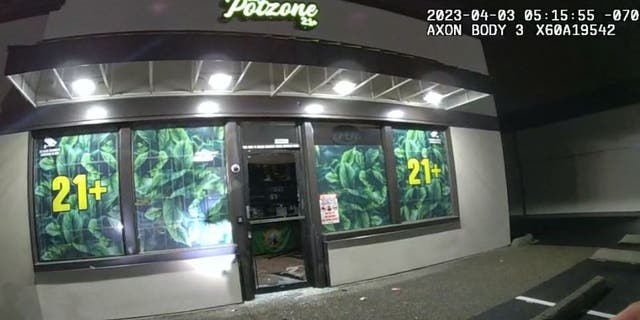 Smashed front door of Potzone in Tacoma, Washington.