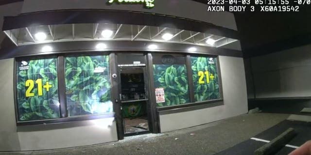 Smashed front door of Potzone in Tacoma, Washington.