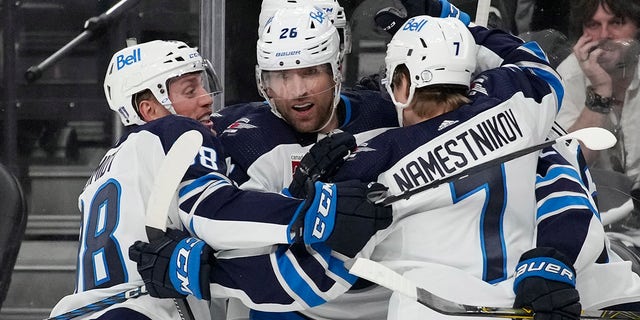 Winnipeg Jets right wing Blake Wheeler (26) celebrates after scoring against the Vegas Golden Knights during the third period of Game 1 of an NHL hockey Stanley Cup first-round playoff series on Tuesday, April 18, 2023, in Las Vegas. 