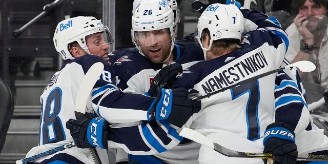 Winnipeg Jets right wing Blake Wheeler (26) celebrates after scoring against the Vegas Golden Knights during the third period of Game 1 of an NHL hockey Stanley Cup first-round playoff series on Tuesday, April 18, 2023, in Las Vegas. 