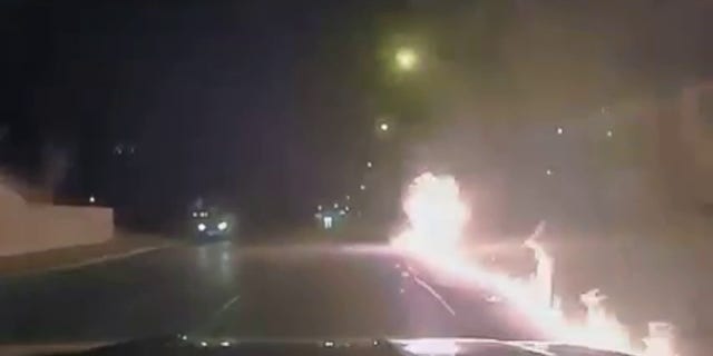 fire engulfing moving minivan