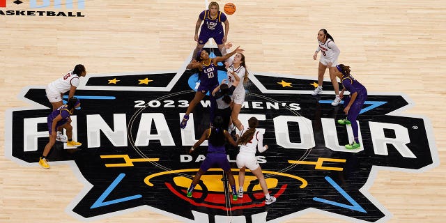 Angel Reese, #10 of the LSU Lady Tigers, faces off against Elizabeth Kitley, #33 of the Virginia Tech Hokies, during the first half of the semifinal game of the Final Four of the 2023 NCAA Women's Basketball Tournament at the American Airlines Center on March 31, 2023. in Dallas, Texas.