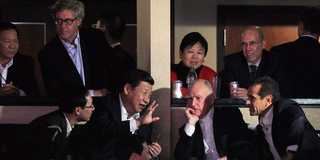 Then-Chinese Vice President Xi Jinping (2nd L), then-California Gov. Jerry Brown (2nd R), then-Los Angeles Mayor Antonio Villaraigosa (R), and then-DreamWorks Animation CEO Jeffrey Katzenberg (2nd Row, R) attend the Los Angeles Lakers and Phoenix Suns NBA basketball game on Feb. 17, 2012 in Los Angeles, Calif.