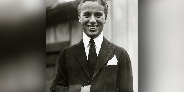 Up-close shot of Charles Chaplin (1889-1977), without mustache. He achieved huge success with the character of "the tramp," a humorous and pathetic character that became world-famous.