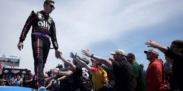 Alex Bowman greeting fans