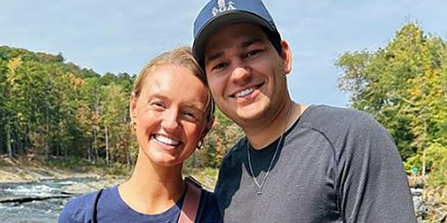 Alex Drummond smiling with her husband