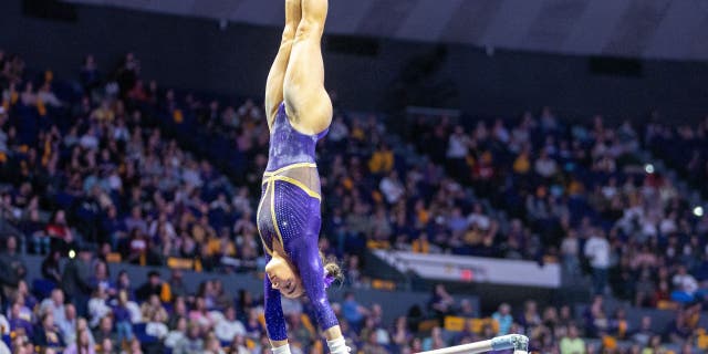 LSU Tigers gymnast Elena Arenas competes on the uneven bars during a match between the LSU Tigers and the Georgia Bulldogs on February 03, 2023, at the Pete Maravich Assembly Center in Baton Rouge, Louisiana.
