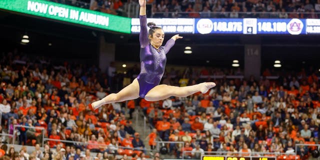 Elena Arenas of LSU competes on the balance beam during a gymnastics meet against Auburn at Neville Arena on February 10, 2023 in Auburn, Alabama.