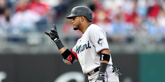 Luis Arraez of the Miami Marlins reacts after his double against the Phillies at Citizens Bank Park on April 11, 2023, in Philadelphia.