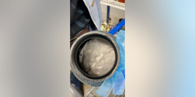 Chase was left in shock when she unscrewed the lid to discover a bag of ashes inside.