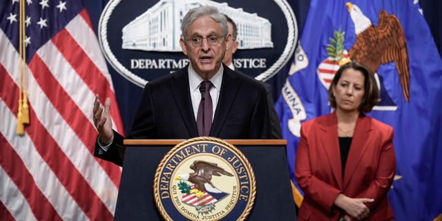 Attorney General Merrick Garland speaks during a news conference at the U.S. Department of Justice headquarters April 14, 2023, in Washington, D.C. Also pictured, at right, is Deputy Attorney General Lisa Monaco.