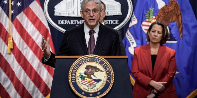 Attorney General Merrick Garland speaks during a news conference at the U.S. Department of Justice headquarters April 14, 2023, in Washington, D.C. Also pictured, at right, is Deputy Attorney General Lisa Monaco.