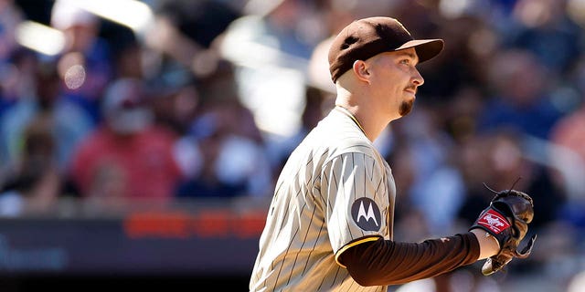 Blake Snell of the San Diego Padres reacts after giving up an RBI single during the sixth inning against the New York Mets at Citi Field April 12, 2023, in the Flushing neighborhood of the Queens borough of New York City. 