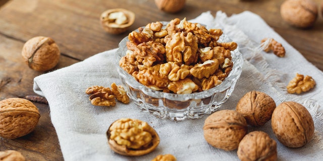 People who eat a cup of walnuts each day have higher levels of healthy bacteria and amino acids that promote heart health.