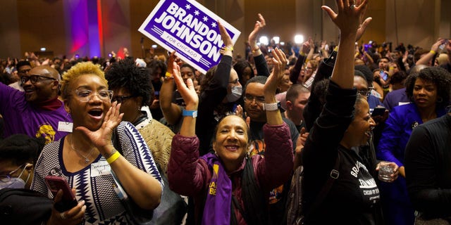 Supporters celebrate after it was reported that Brandon Johnson had taken a lead against Paul Vallas in the mayoral runoff election during a Johnson election night gathering at Marriott Marquis Chicago hotel on Tuesday, April 4, 2023, in Chicago.