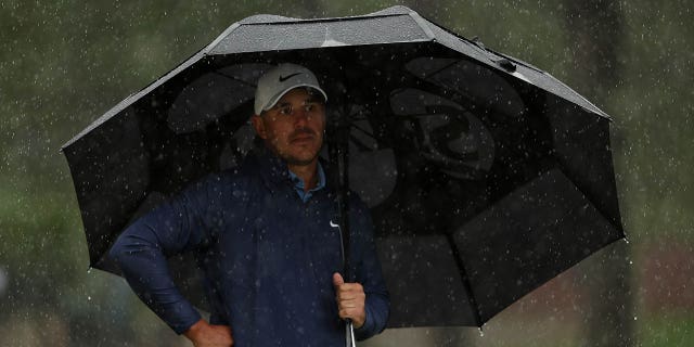 Brooks Koepka of the United States looks on from the seventh green during the third round of the 2023 Masters Tournament at Augusta National Golf Club April 8, 2023, in Augusta, Ga.