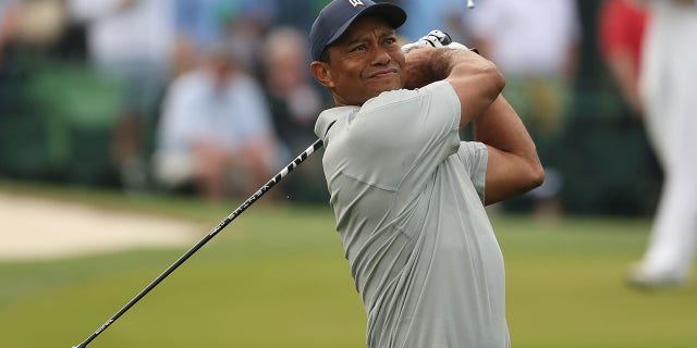 Tiger Woods of the United States plays his shot from the third tee during a practice round prior to the 2023 Masters Tournament at Augusta National Golf Club on April 04, 2023 in Augusta, Georgia.