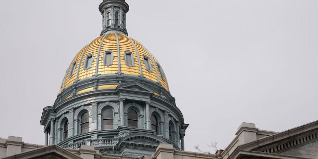 The gold dome of the Colorado State Capitol is seen on March 23, 2023, in Denver. Lawmakers in states such as Colorado, New York, and Florida have proposed relief measures to protect the millions of Americans crippled in medical debt.