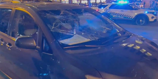 Car window smashed as teens caused chaos in downtown Chicago Saturday.