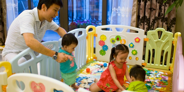 chinese nationals using americans as surrogates