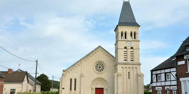 The church has since been rebuilt — and the cross will return home this June. 