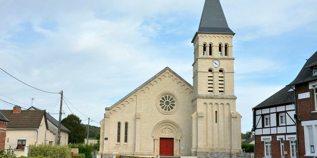 The church has since been rebuilt — and the cross will return home this June.