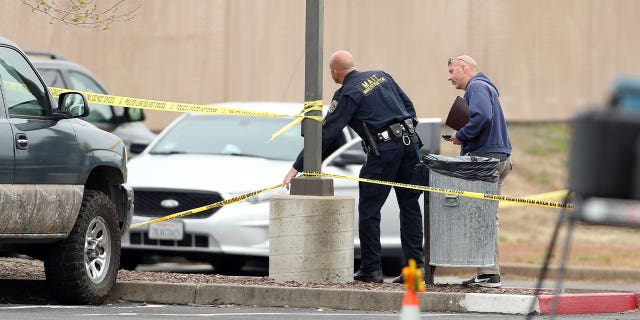 Police investigate a shooting near Mahany Park in Roseville, California, on April 6, 2023. Authorities said that the suspected gunmen who killed one hostage was wearing a body-armor vest. 