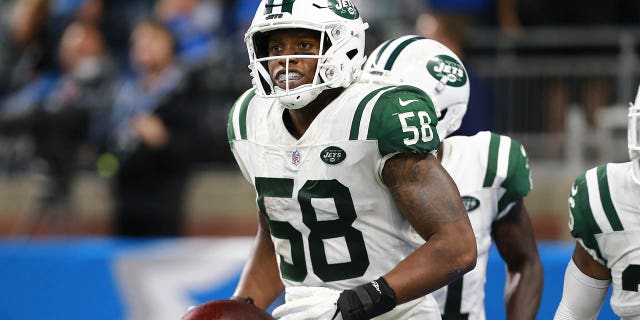 Darron Lee of the New York Jets intercepts a pass and runs it in for a touchdown against the Detroit Lions at Ford Field Sept. 10, 2018, in Detroit.