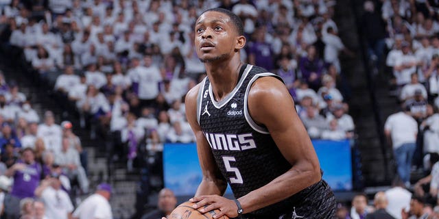 De'Aaron Fox #5 of the Sacramento Kings prepares to shoot a free throw during Round One Game One of the 2023 NBA Playoffs against the Golden State Warriors on April 15, 2023, at Golden 1 Center in Sacramento, California. 