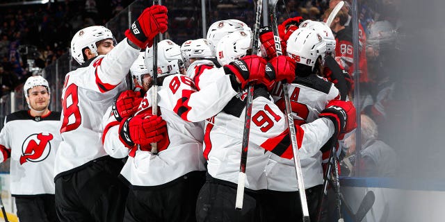 Devils mob after overtime win