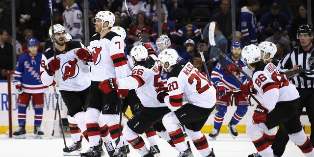 Devils celebrate overtime winner