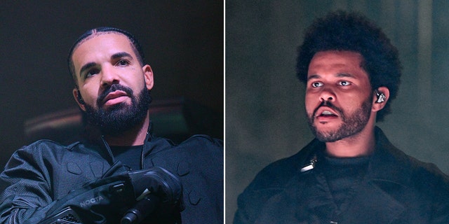 Drake looks off in the distance on stage in all black, holding a microphone with gloves split The Weeknd looks off in the opposite distance with some smoke behind him on stage