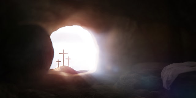 Empty tomb symbolizing the death and resurrection of Jesus Christ Easter and the cross of sacrifice and suffering.